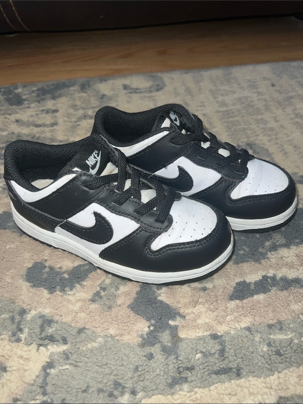 Nike Kids Black and White Low-Top Sneakers with Swoosh